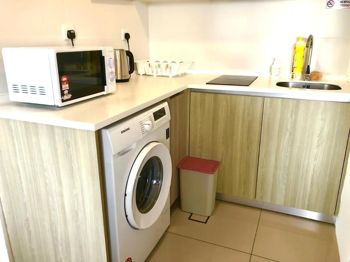 Tropicana 218 Macalister Netflix Unit By Blue Sky Holidays George Town